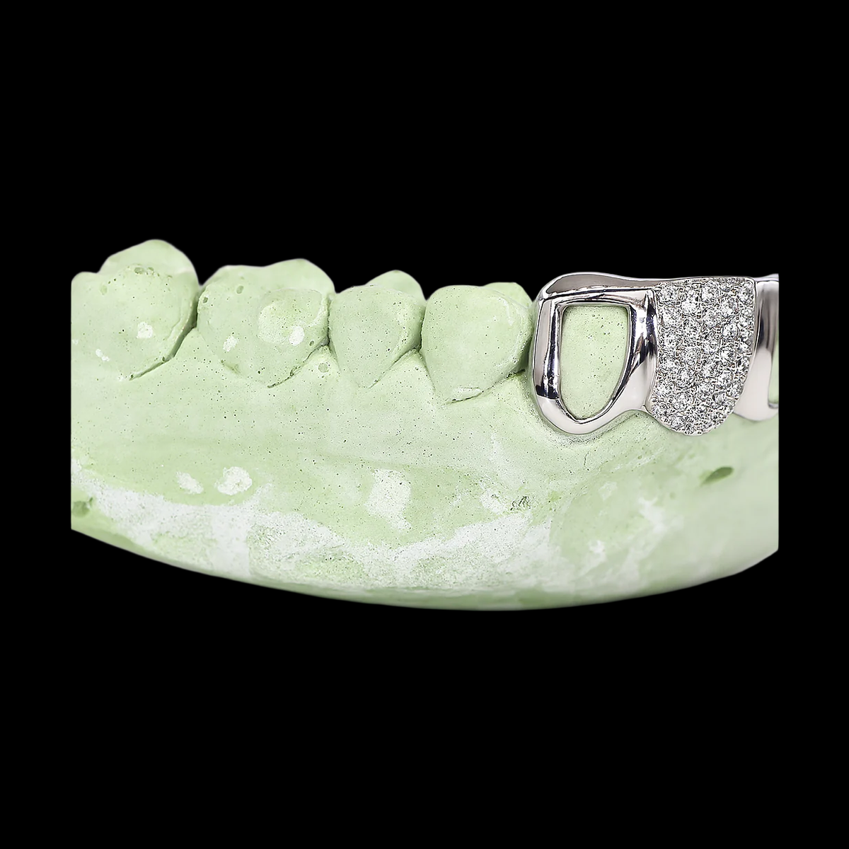 Silver VVS 1 Tooth Diamond & 2 Teeth Open Faced Moissanite Grillz on dental mold