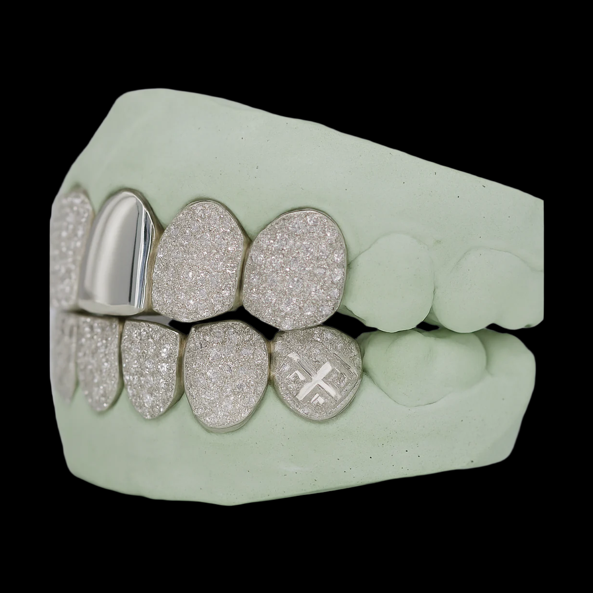 Custom engraved cross logo silver grillz with mixed iced and polished teeth