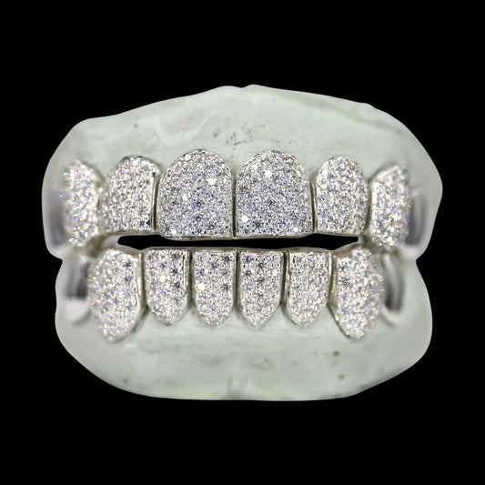 Silver 8 on 8 Moissanite diamond grillz set on dental mold showing full upper and lower coverage