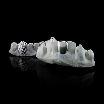 .925 Sterling Silver single tooth diamond cut grillz on dental mold