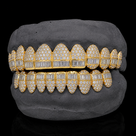 Front view of yellow gold baguette hybrid diamond grillz on display block