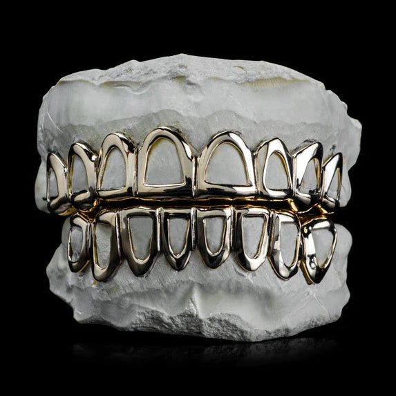 Two-tone gold and silver open-face grillz set with precision fit