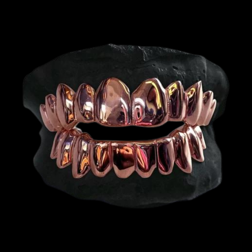 Rose gold custom fitted grillz on black mold