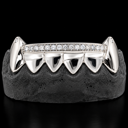 Silver upper grillz with sharp pointed teeth and continuous diamond row
