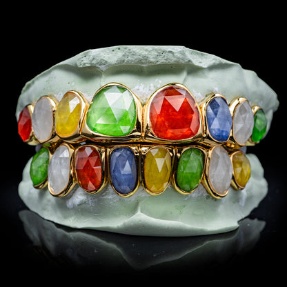 Professional multi-facet gemstone grillz showcasing intricate cut and polished surface