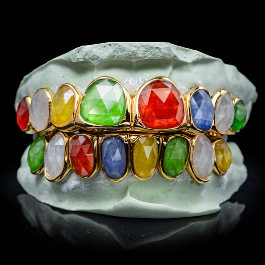 Professional multi-facet gemstone grillz showcasing intricate cut and polished surface