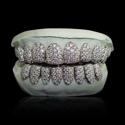 Sterling silver VVS moissanite grillz with large 2mm stones in honeycomb zigzag setting on dental mold