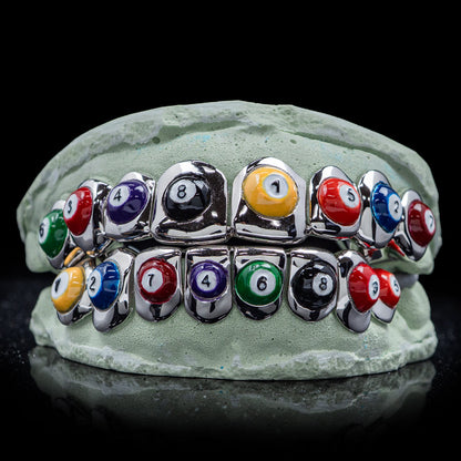 8-Ball Pool Grillz – sleek black enamel grillz with 8-ball design, perfect for stylish, professional look.