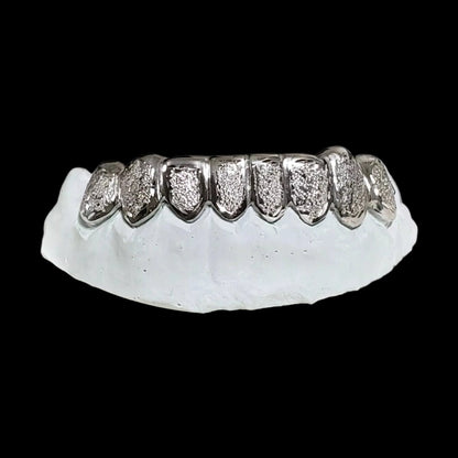 Silver diamond dust lower custom grillz on white mold