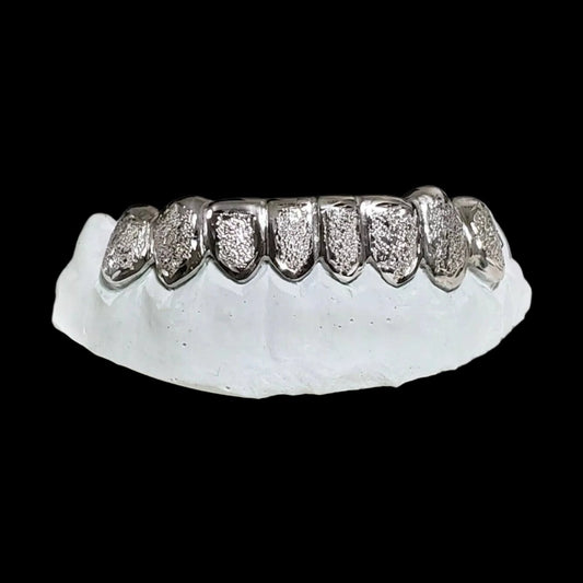 Silver diamond dust lower custom grillz on white mold