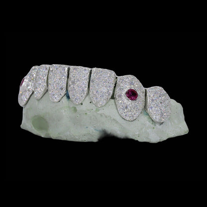 VVS Moissanite Ruby Stone Fang Diamond Grillz in silver with red ruby fangs and white diamond teeth