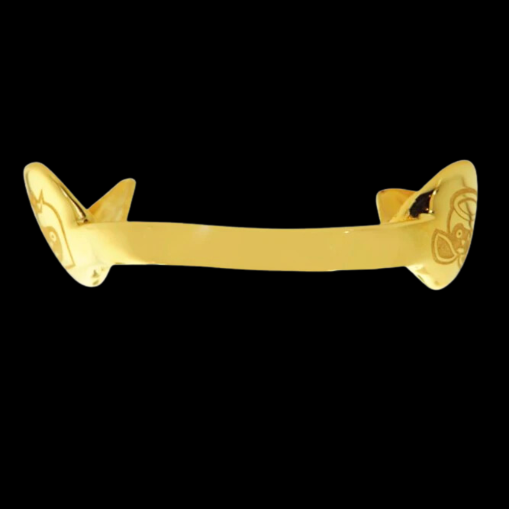 2 Engraved Teeth.