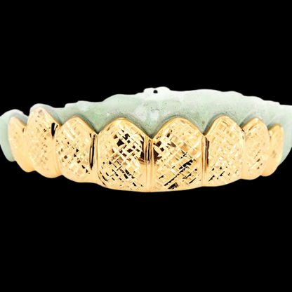 8 Piece Solid Grill With Diamond Cuts.