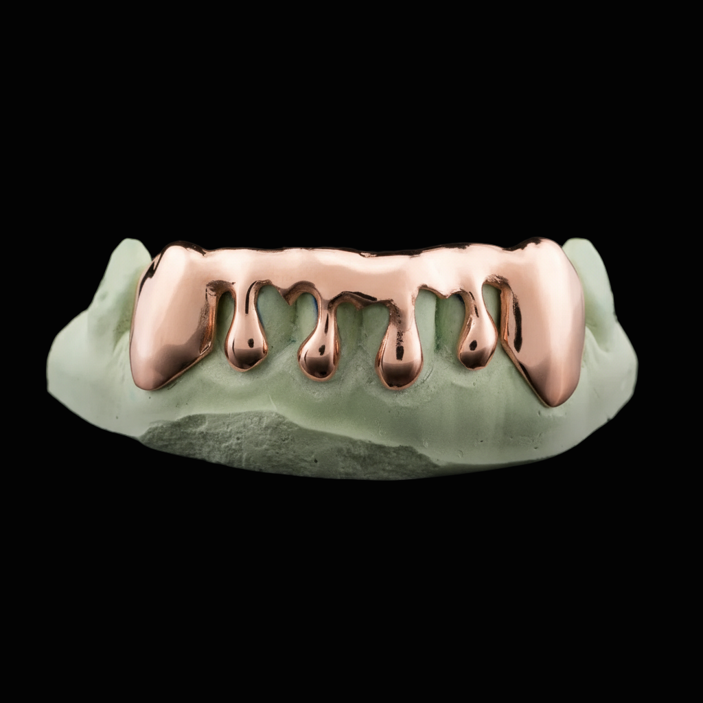 Rose gold grill on a green background
