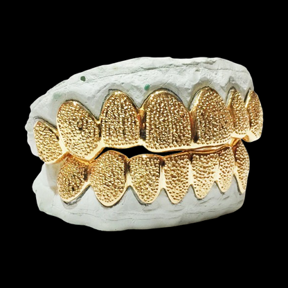 Upper and lower 8-piece 18K gold plated diamond dust cut teeth grillz