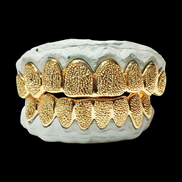 8-piece 18K gold plated diamond dust cut grillz on dental mold
