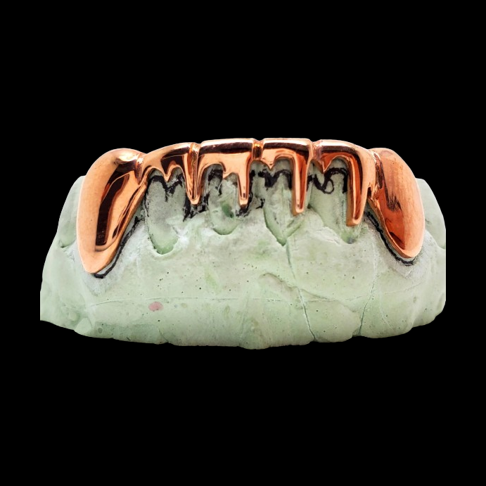 Front view of removable upper drip style sterling silver teeth jewelry